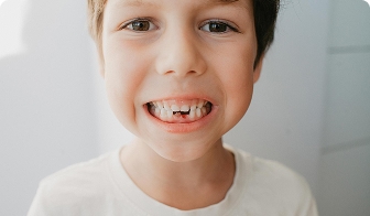 Dentist reviewing a child's bite development