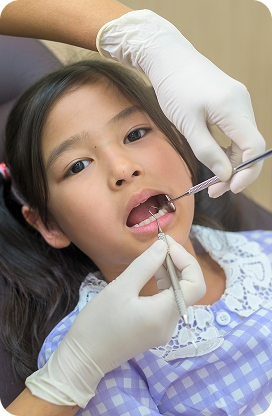 Child having a routine dental checkup