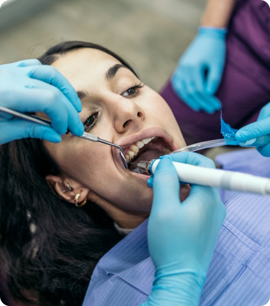 Young child smiling and showing healthy teeth