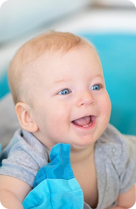 Toddler smiling with healthy baby teeth