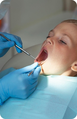 Child smiling after a gentle dental visit