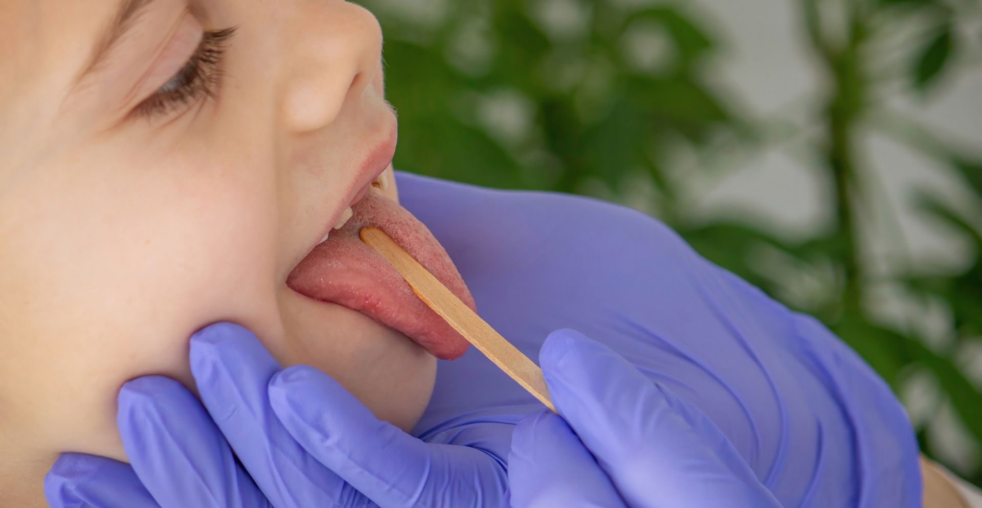 Parent comforting a child after a gentle dental procedure