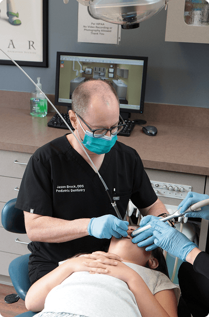A child receiving a dental crown at Big Picture Pediatric Dentistry