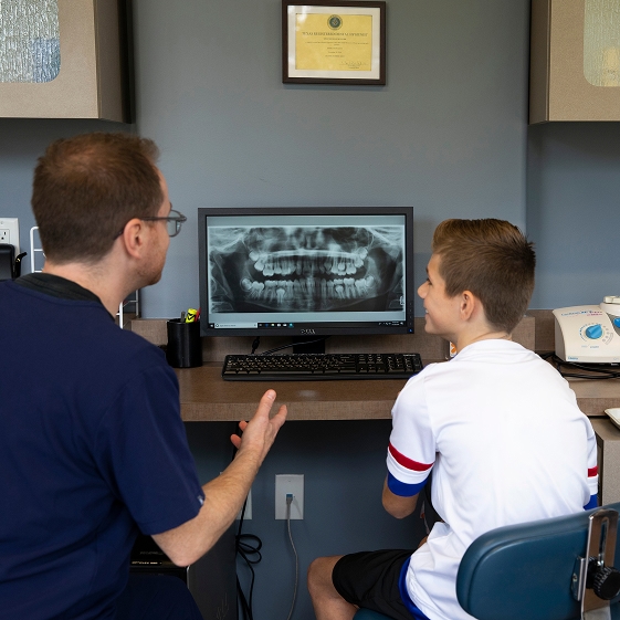 Teen at a catch-up dental visit